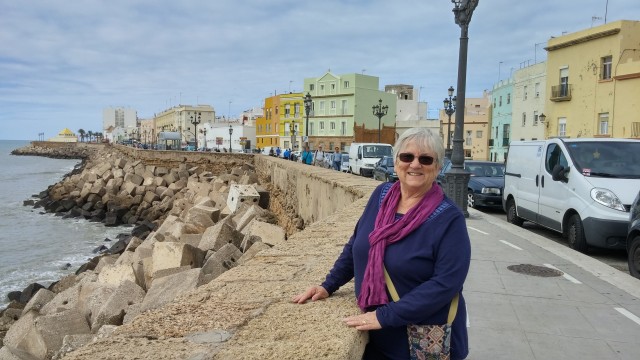 Pat along the sea wall in Cadiz.